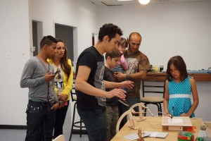 Fab Lab Executive Director Gustavo Arriaga demonstrates how to use the Gatorgraph, a geometric drawing machine created through Kickstarter. 